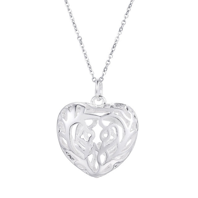 Elegant charm retro exquisite hollow heart pendant