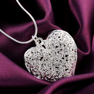 Elegant charm retro exquisite hollow heart pendant